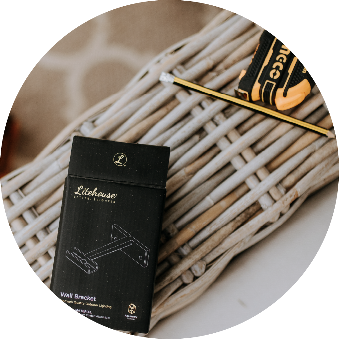 Litehouse wall bracket packaging on a woven surface